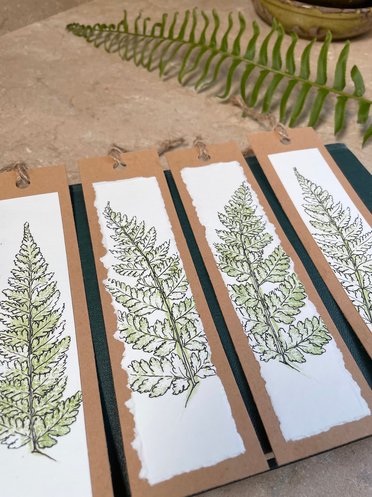 Elegant bookmarks decorated with hammered ferns to enhance your reading experience